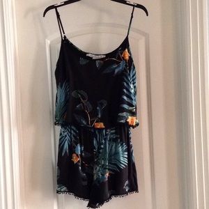 Fun tropical print black romper!